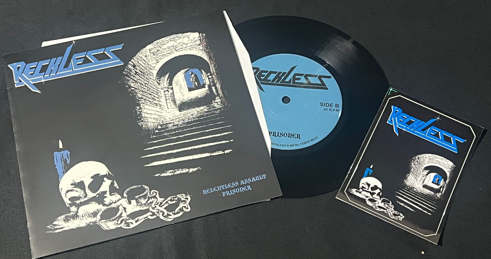 RECKLESS  "Relentless Assault/Prisoner"